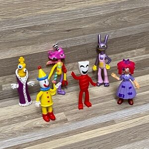 Amazing digital circus characters like Pomni, Jax, Ragatha, Caine, and Kinger.